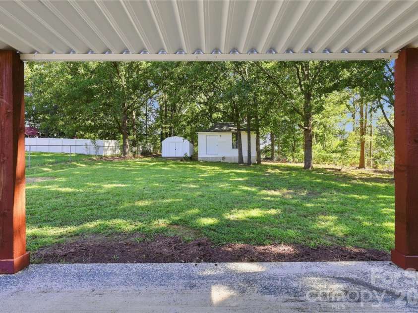 5241 Short Cut Lane, Indian Trail, NC 28079.  MLS# CAR4415304, YatesRealty ID 46636. Covered Patio