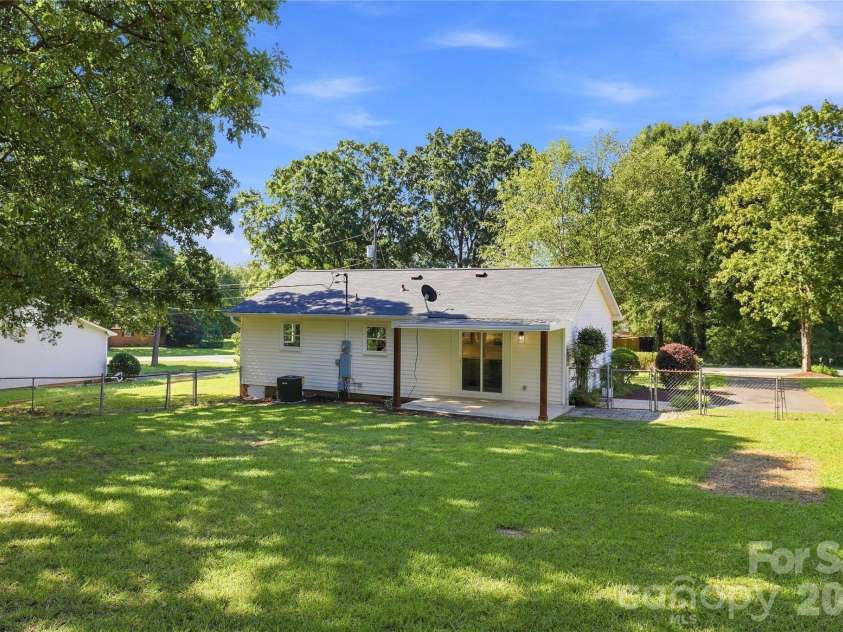 5241 Short Cut Lane, Indian Trail, NC 28079.  MLS# CAR4415304, YatesRealty ID 46636. Large, fenced back yard