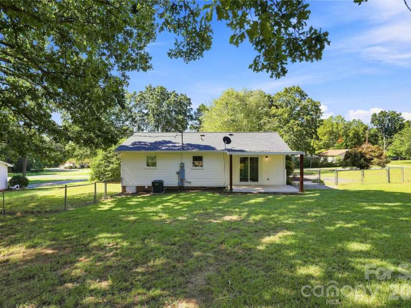 5241 Short Cut Lane, Indian Trail, NC 28079.  MLS# CAR4415304, YatesRealty ID 46636. Large, fenced back yard