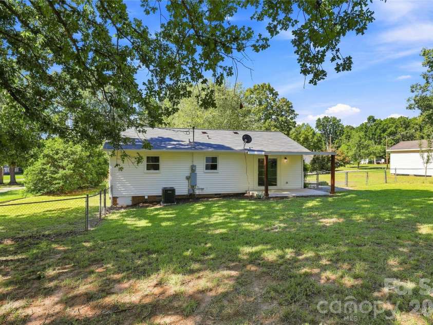 5241 Short Cut Lane, Indian Trail, NC 28079.  MLS# CAR4415304, YatesRealty ID 46636. Large, fenced back yard