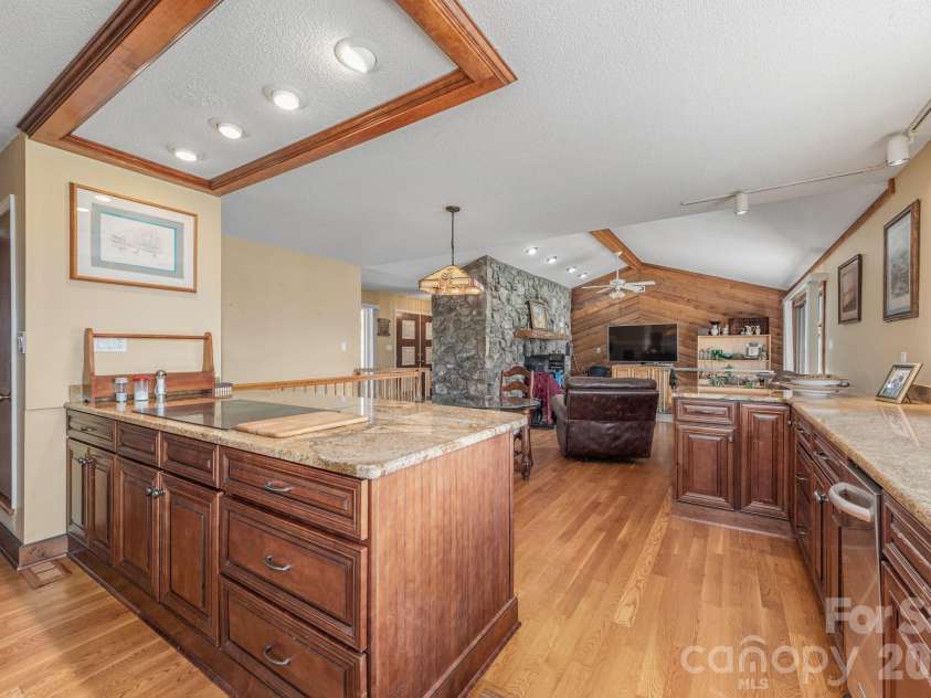 151 Bridlewood Drive, Mooresville, NC 28117.  MLS# CAR4346334, YatesRealty ID 4664. Kitchen island with open living room