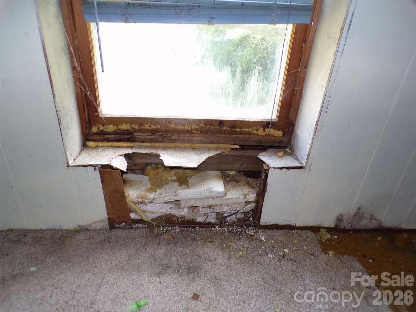 2131 Somerset Drive, Hendersonville, NC 28791.  MLS# CAR4417277, YatesRealty ID 46640. Attic window
