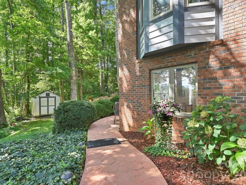 25 Weston Heights Drive, Asheville, NC 28803.  MLS# CAR4417799, YatesRealty ID 46650. Brick walkway