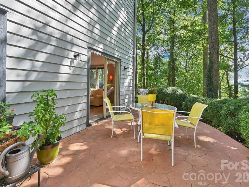 25 Weston Heights Drive, Asheville, NC 28803.  MLS# CAR4417799, YatesRealty ID 46650. Lower level patio