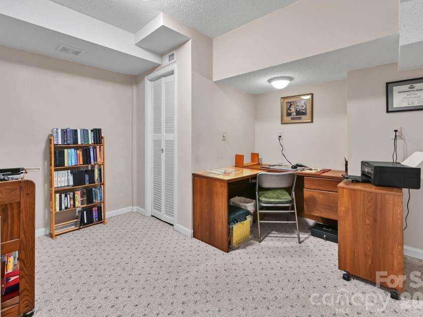 25 Weston Heights Drive, Asheville, NC 28803.  MLS# CAR4417799, YatesRealty ID 46650. Office