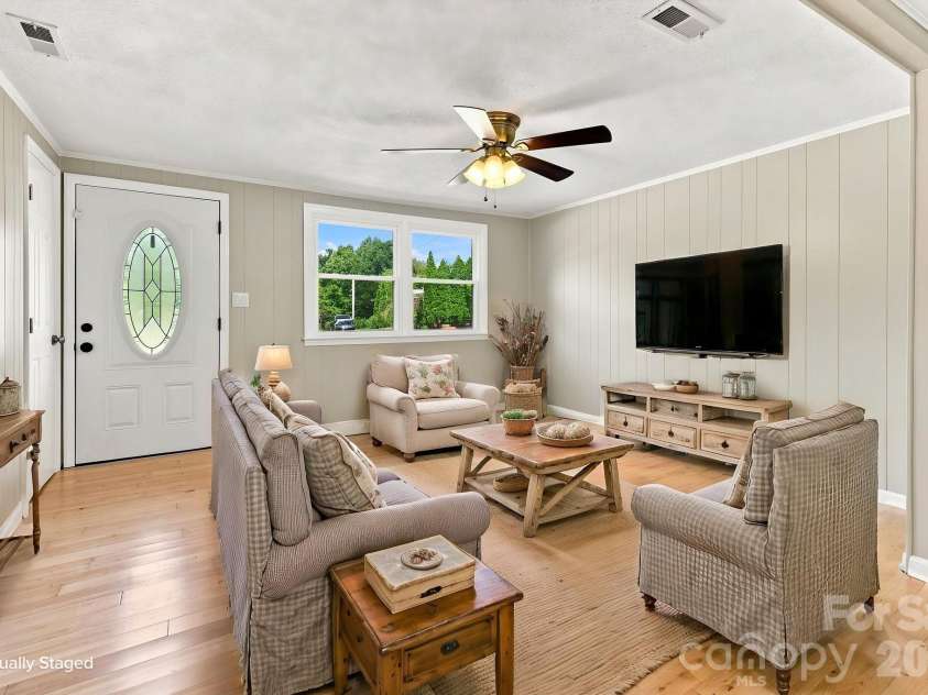1021 Caldwell Avenue, Newton, NC 28658.  MLS# CAR4417463, YatesRealty ID 46656. Living Room virtually staged