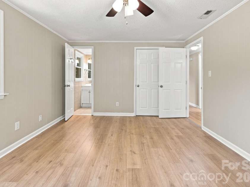 1021 Caldwell Avenue, Newton, NC 28658.  MLS# CAR4417463, YatesRealty ID 46656. Primary bedroom