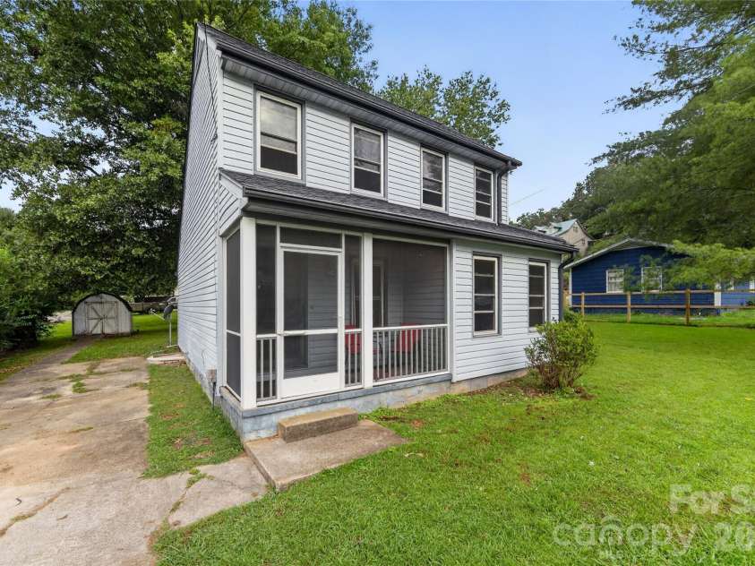 131 Spencer Street, Clyde, NC 28721.  MLS# CAR4417558, YatesRealty ID 46666. Flat lot and not in a flood zone -