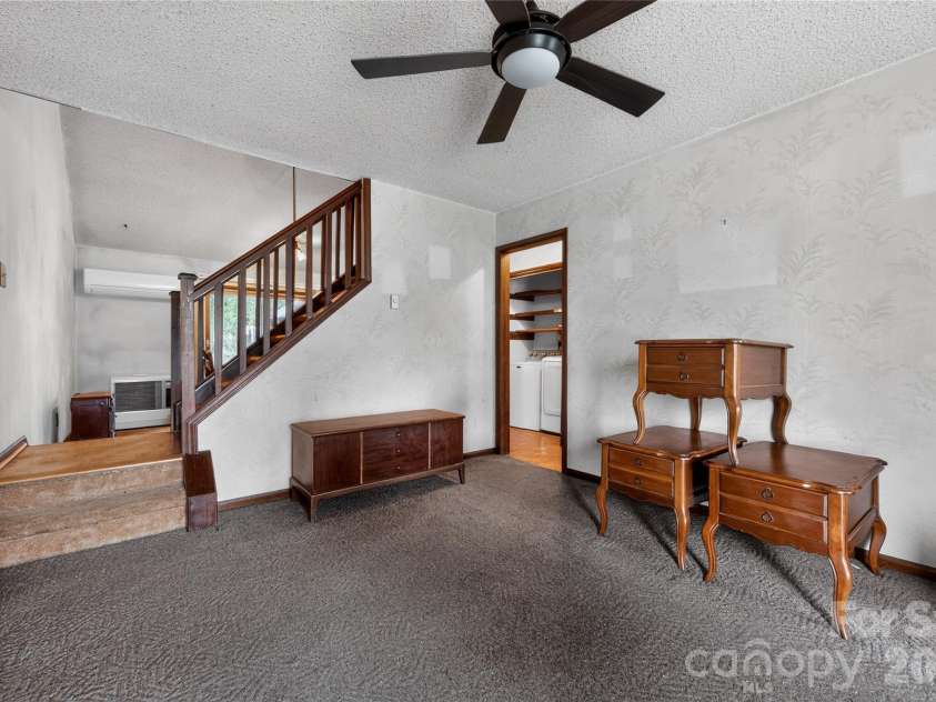 131 Spencer Street, Clyde, NC 28721.  MLS# CAR4417558, YatesRealty ID 46666. Layout of living room  - clever layout to everything on main floor-