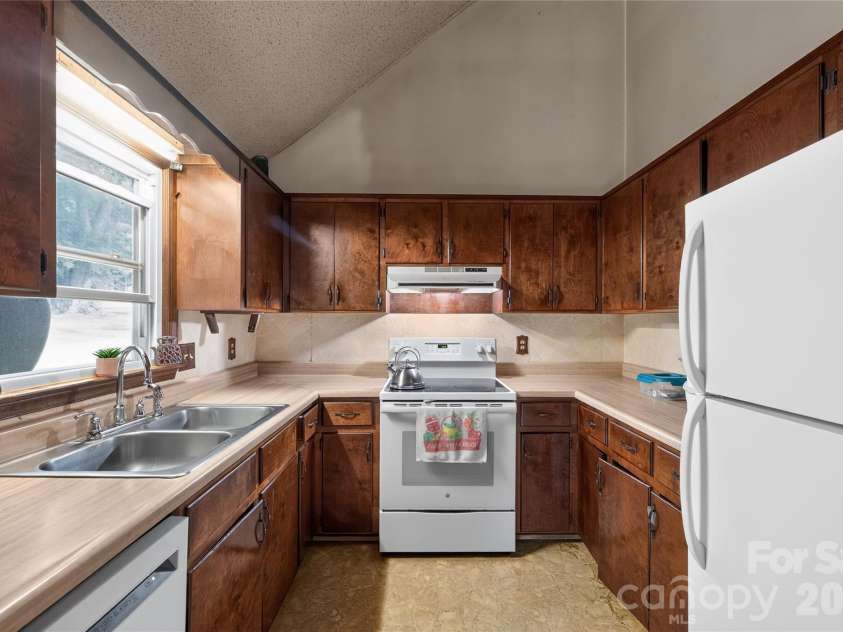 131 Spencer Street, Clyde, NC 28721.  MLS# CAR4417558, YatesRealty ID 46666. New fridge, new you
