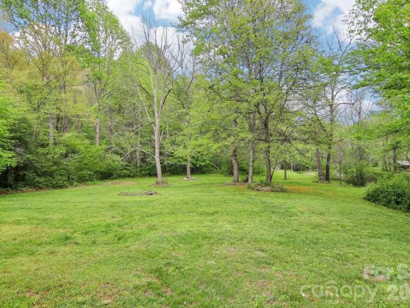 165 Sequoyah Drive, Waynesville, NC 28785.  MLS# CAR4346043, YatesRealty ID 4667. Located on a sprawling 1.4-acre property