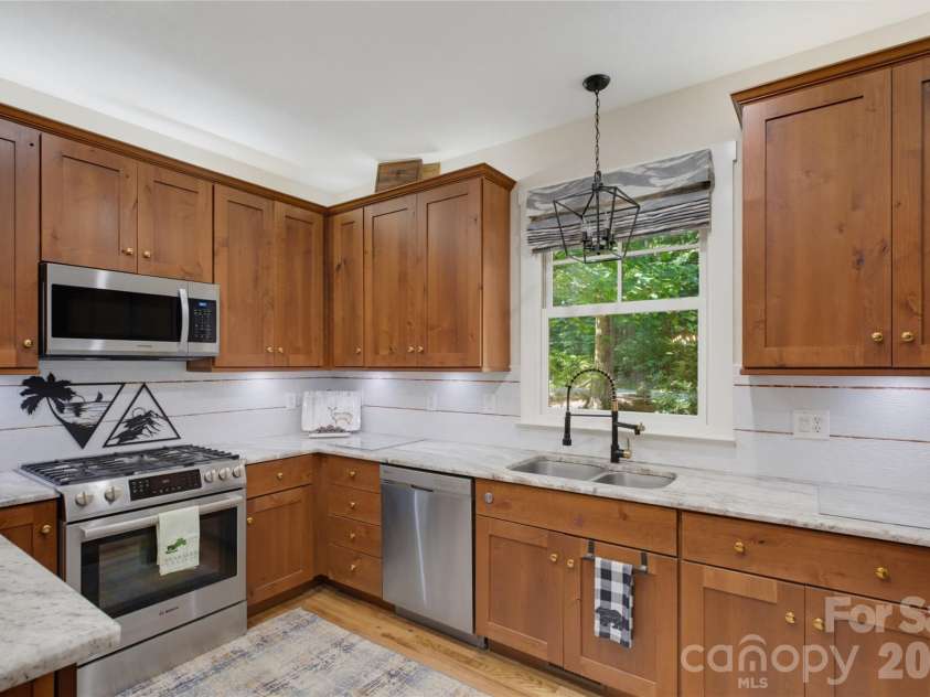 325 Hedgewood Drive, Tuckasegee, NC 28783.  MLS# CAR4399798, YatesRealty ID 46681. 