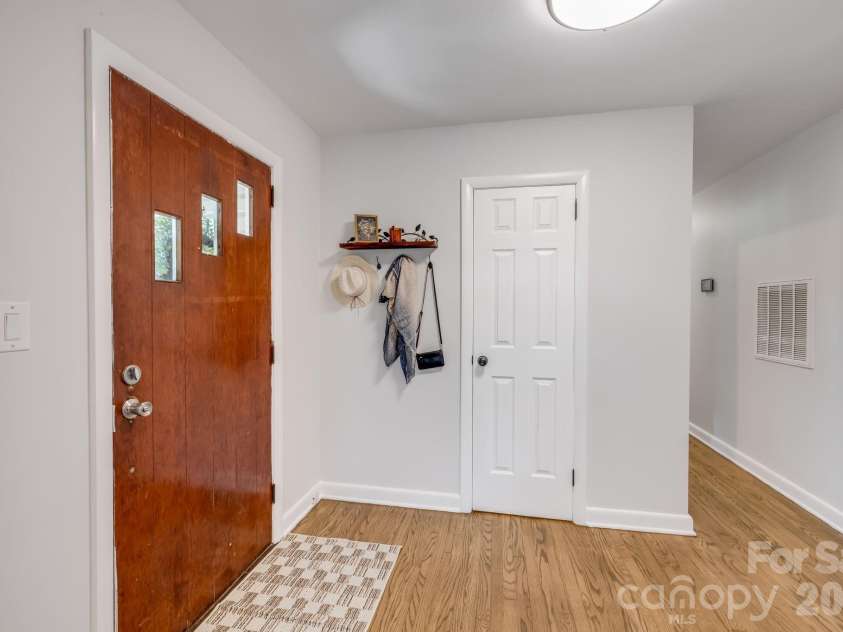1772 NC 9 Highway, Black Mountain, NC 28711.  MLS# CAR4417247, YatesRealty ID 46683. From the foyer down the hallway