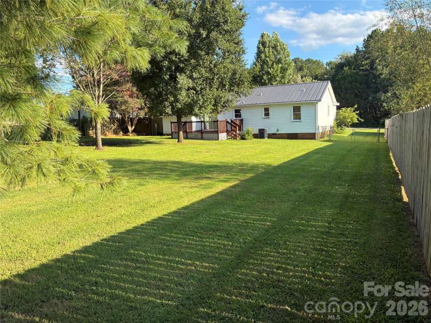 1008 Hopedale Drive, Lenoir, NC 28645.  MLS# CAR4418081, YatesRealty ID 46686. BACKYARD FLAT AND FENCED