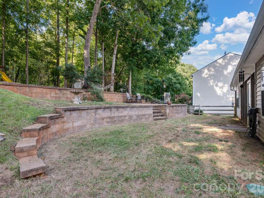 4311 Wiregrass Road, Indian Land, SC 29707.  MLS# CAR4416404, YatesRealty ID 46688. Backyard