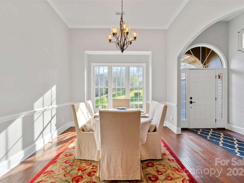 160 Fairway Falls Road, Mills River, NC 28759.  MLS# CAR4202772, YatesRealty ID 4670. Large formal dining room with plenty of natural light and high ceilings