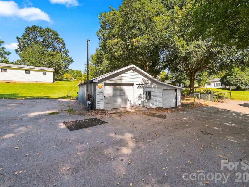 1261 Davis Road, Lincolnton, NC 28092.  MLS# CAR4404751, YatesRealty ID 46702. View of buildings.  Both have power