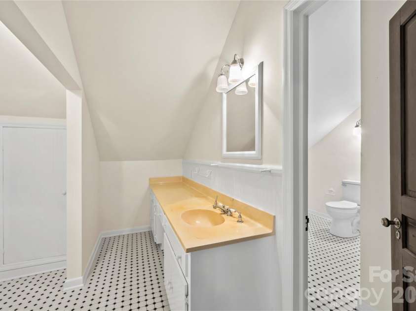 103 Hyde Avenue, Tryon, NC 28782.  MLS# CAR4416378, YatesRealty ID 46703. Bathroom #3 Upper Floor
