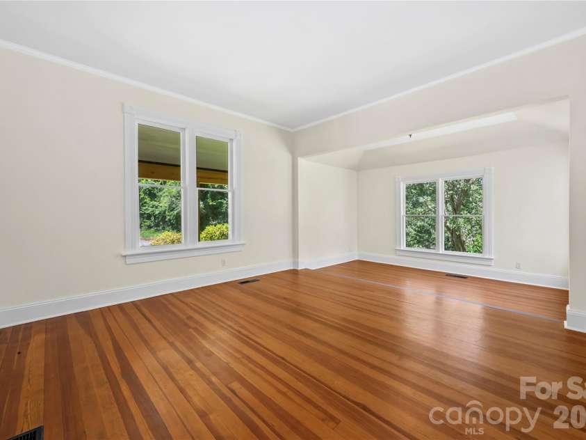 103 Hyde Avenue, Tryon, NC 28782.  MLS# CAR4416378, YatesRealty ID 46703. Bedroom #1 with Sitting Area - Main Floor