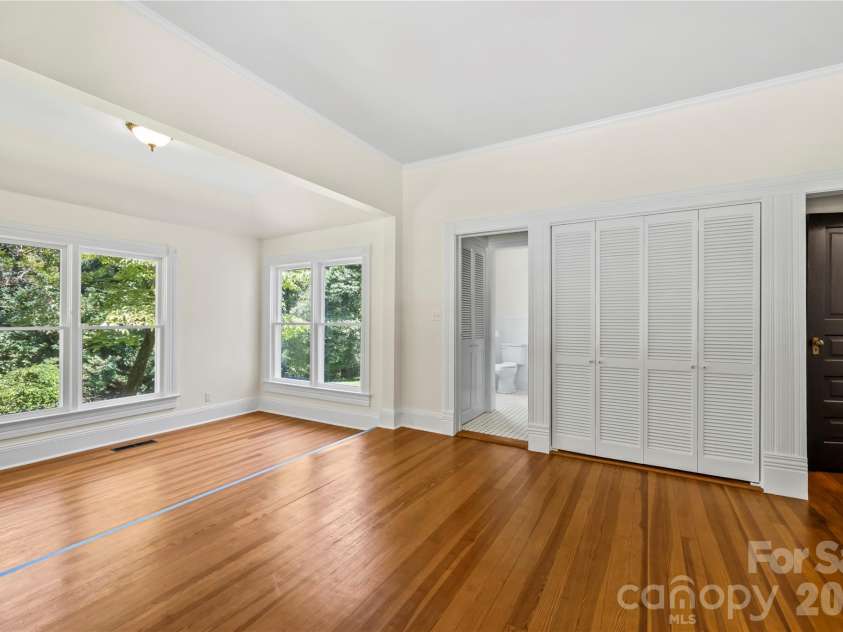 103 Hyde Avenue, Tryon, NC 28782.  MLS# CAR4416378, YatesRealty ID 46703. Bedroom #1 with Sitting Area - Main Floor