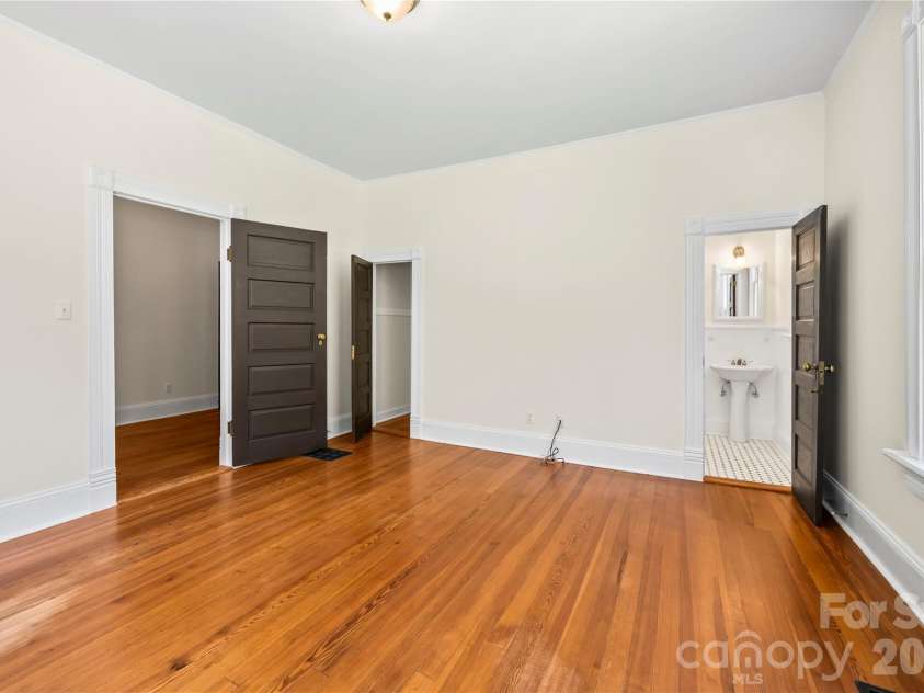 103 Hyde Avenue, Tryon, NC 28782.  MLS# CAR4416378, YatesRealty ID 46703. Bedroom #2 Main Floor