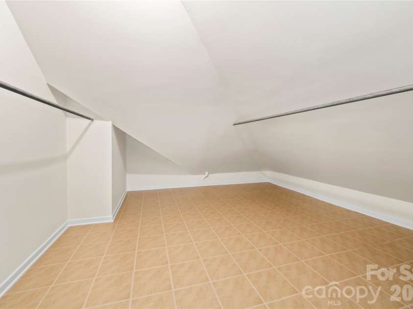 103 Hyde Avenue, Tryon, NC 28782.  MLS# CAR4416378, YatesRealty ID 46703. Walk In Closet - Upper