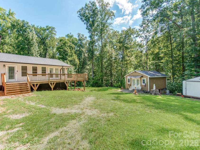 7124 Ridge Lane Road, Charlotte, NC 28262.  MLS# CAR4411281, YatesRealty ID 46708. A second Living Quarters Cabin Overlooking the Private Back Yard!