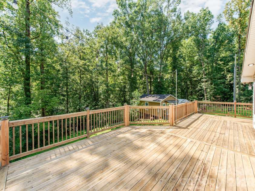 7124 Ridge Lane Road, Charlotte, NC 28262.  MLS# CAR4411281, YatesRealty ID 46708. Beautiful Wrap Around Porch overlooks the Expansive and Private BackYard