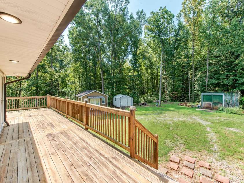 7124 Ridge Lane Road, Charlotte, NC 28262.  MLS# CAR4411281, YatesRealty ID 46708. Beautiful Wrap Around Porch overlooks the Expansive and Private BackYard