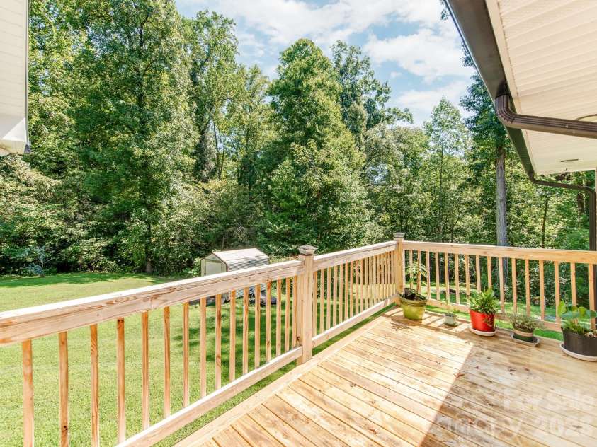 7124 Ridge Lane Road, Charlotte, NC 28262.  MLS# CAR4411281, YatesRealty ID 46708. Beautiful Wrap Around Porch overlooks the Expansive and Private BackYard