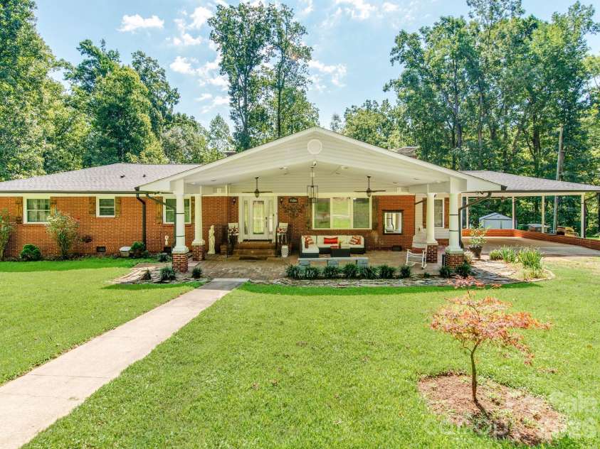 7124 Ridge Lane Road, Charlotte, NC 28262.  MLS# CAR4411281, YatesRealty ID 46708. Covered Front Porch