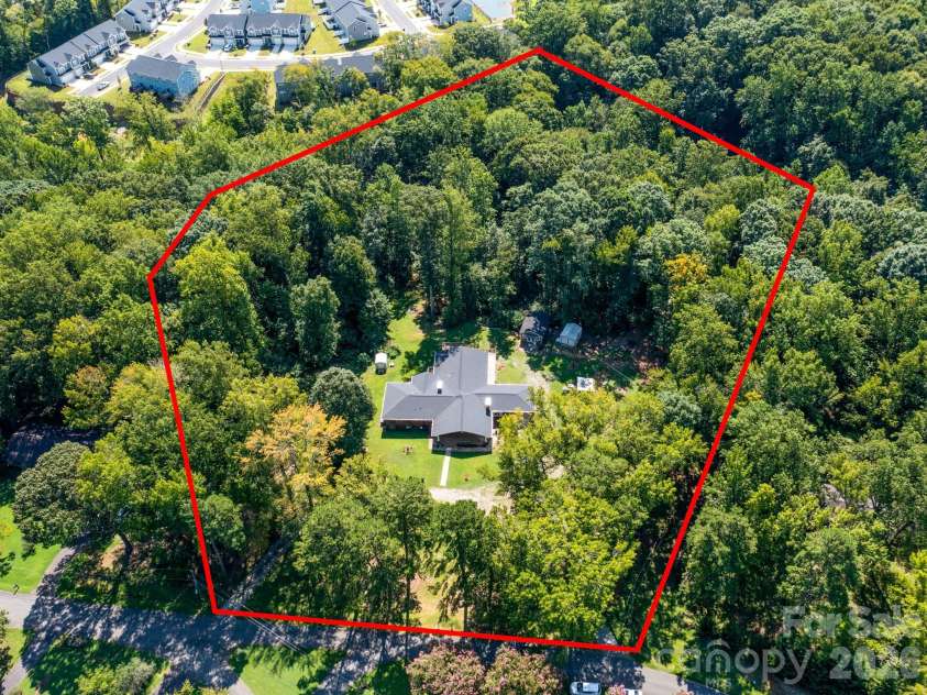 7124 Ridge Lane Road, Charlotte, NC 28262.  MLS# CAR4411281, YatesRealty ID 46708. Luxuriously Updated Home with 6+ Acres and a Detached Second Living Quarters!