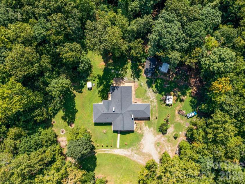 7124 Ridge Lane Road, Charlotte, NC 28262.  MLS# CAR4411281, YatesRealty ID 46708. Private 6+ Acres