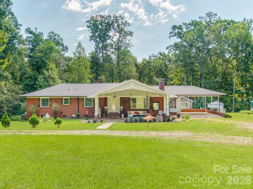 7124 Ridge Lane Road, Charlotte, NC 28262.  MLS# CAR4411281, YatesRealty ID 46708. Private 6+ Acres with Updated Home and 2nd Living Quarters Detached