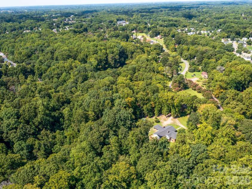 7124 Ridge Lane Road, Charlotte, NC 28262.  MLS# CAR4411281, YatesRealty ID 46708. Unparalleled Privacy without compromise to and from Uptown