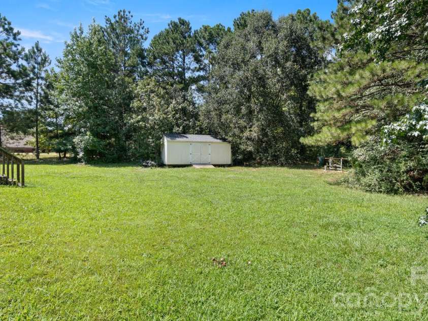 602 Preston Brooks Drive, Catawba, SC 29704.  MLS# CAR4415484, YatesRealty ID 46718. Huge flat backyard with shed