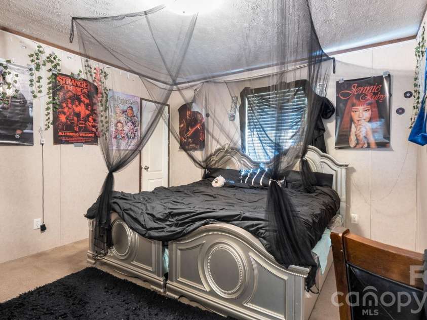 602 Preston Brooks Drive, Catawba, SC 29704.  MLS# CAR4415484, YatesRealty ID 46718. Secondary Bedroom 2: Bright secondary bedroom with comfortable space and closet storage.