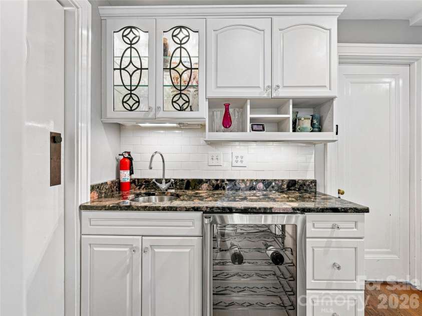 14 Griffing Boulevard, Asheville, NC 28804.  MLS# CAR4413603, YatesRealty ID 46721. Convenient wet baar with granite and wine refrigerator