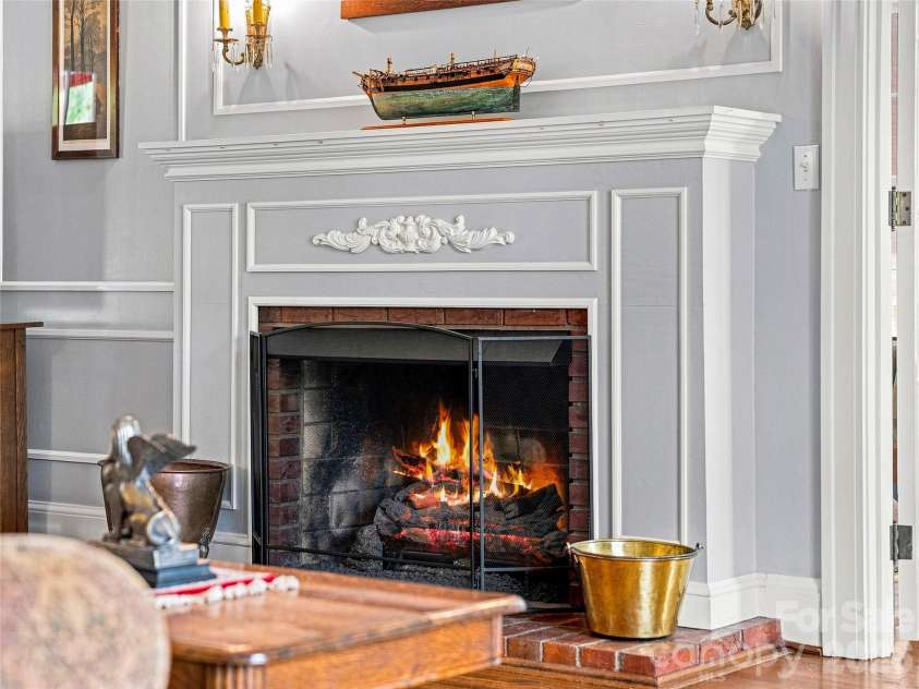 14 Griffing Boulevard, Asheville, NC 28804.  MLS# CAR4413603, YatesRealty ID 46721. Detailed fireplace and mantel add historic character