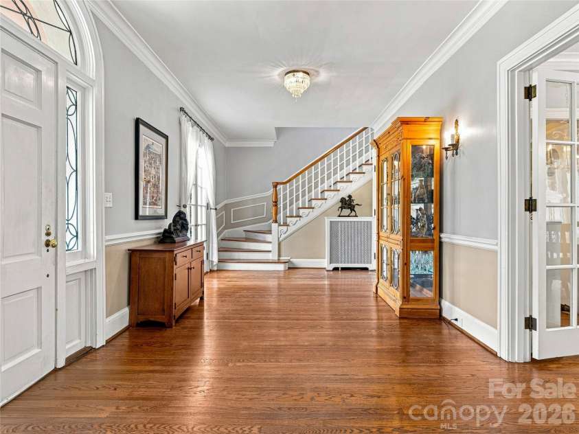 14 Griffing Boulevard, Asheville, NC 28804.  MLS# CAR4413603, YatesRealty ID 46721. Gracious entry foyer with original hardwood floors.