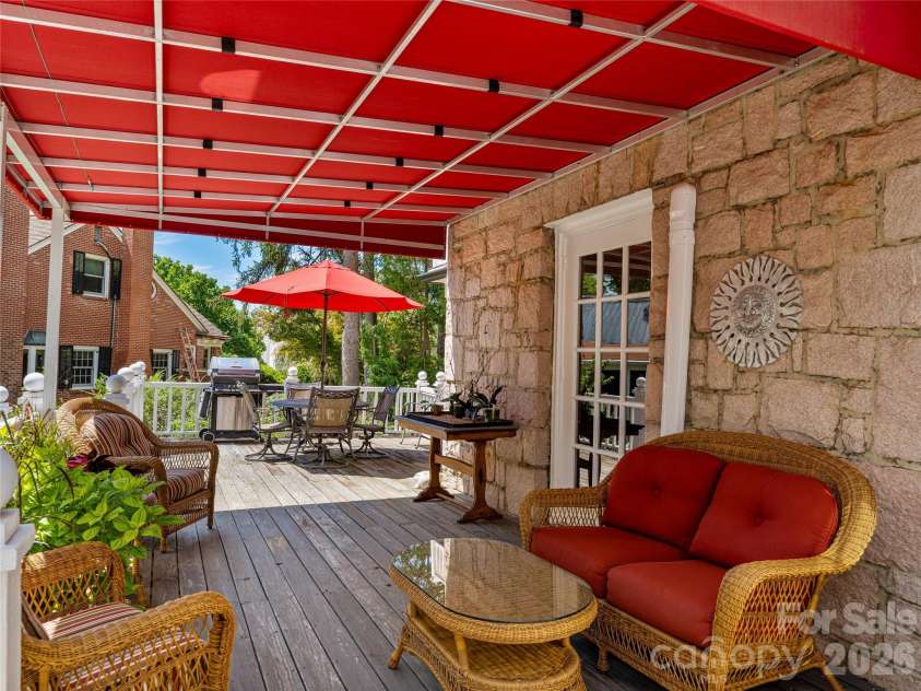 14 Griffing Boulevard, Asheville, NC 28804.  MLS# CAR4413603, YatesRealty ID 46721. Relax on the covered deck...