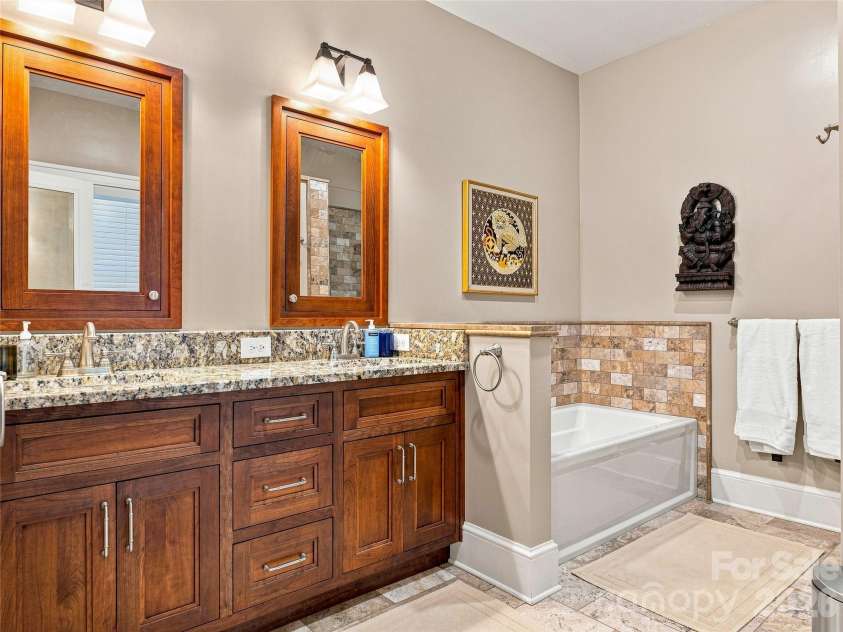 14 Griffing Boulevard, Asheville, NC 28804.  MLS# CAR4413603, YatesRealty ID 46721. Updated primary bath