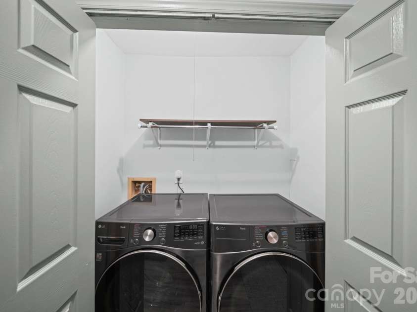 503 Gooseneck Drive, Cary, NC 27513.  MLS# CAR4418013, YatesRealty ID 46726. Hallway Laundry