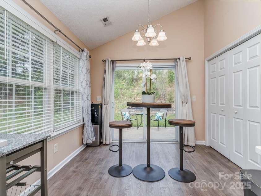163 Brookshire Drive, Fort Mill, SC 29715.  MLS# CAR4234398, YatesRealty ID 4673. Dining Area with Access to Back Patio