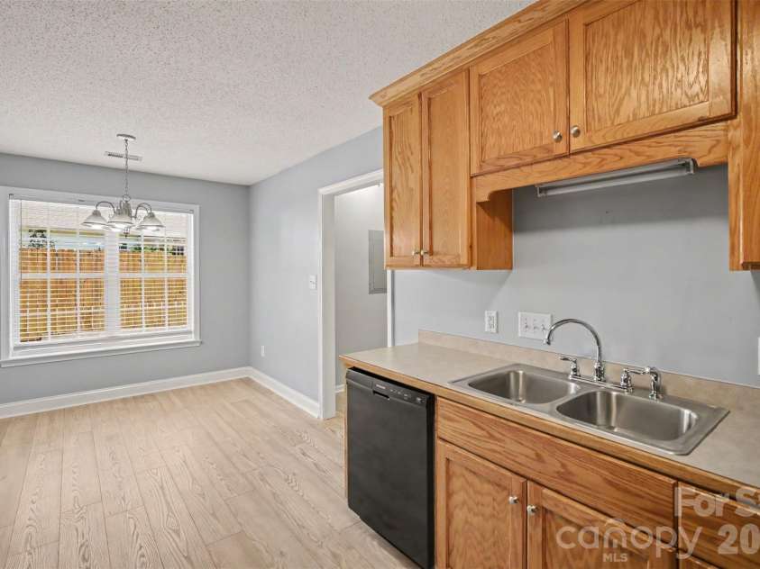 304 Llewellyn Street, Belmont, NC 28012.  MLS# CAR4413586, YatesRealty ID 46738. Kitchen and dining