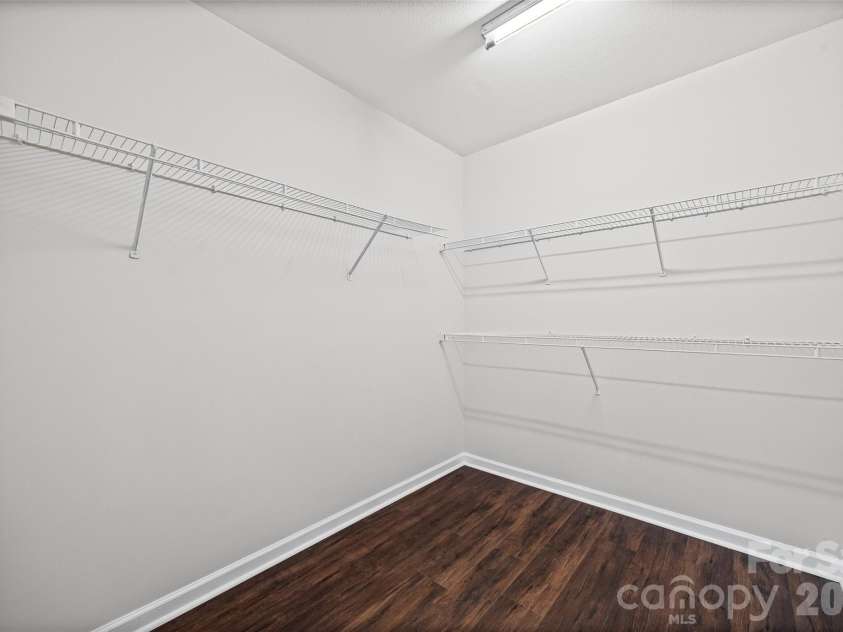 2051 Moss Creek Drive, Harrisburg, NC 28075.  MLS# CAR4344478, YatesRealty ID 4674. Large walk in closet.