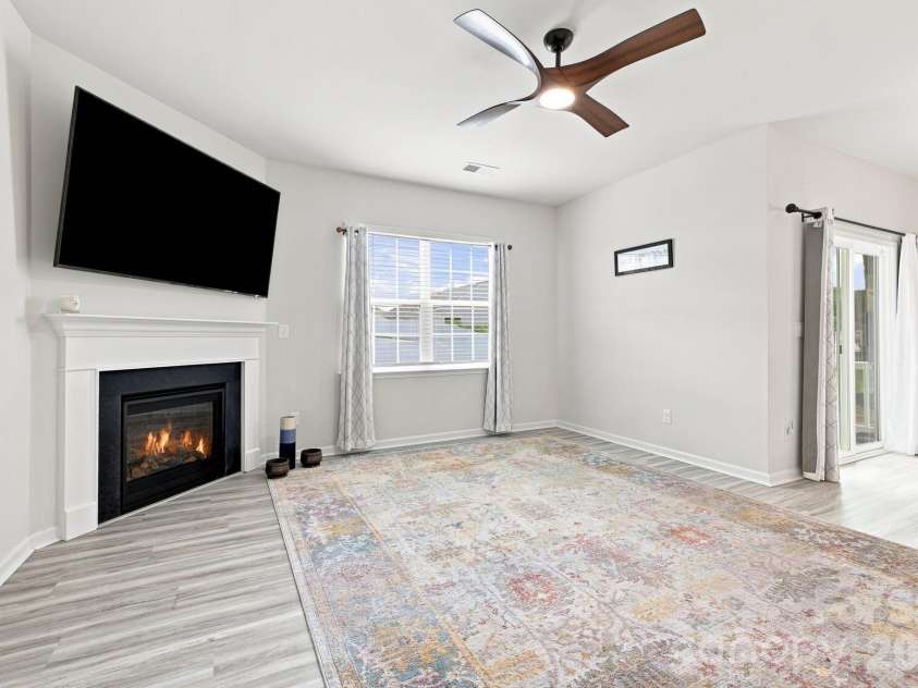 3662 Charles Street, Conover, NC 28613.  MLS# CAR4417291, YatesRealty ID 46741. Fireplace virtually lit