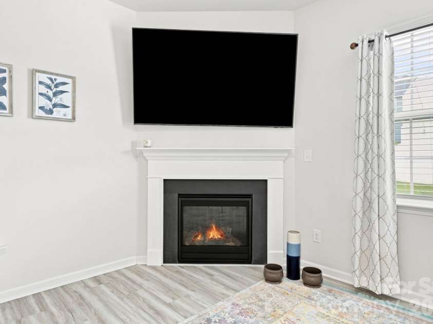 3662 Charles Street, Conover, NC 28613.  MLS# CAR4417291, YatesRealty ID 46741. Fireplace virtually lit