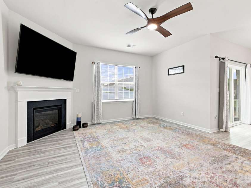 3662 Charles Street, Conover, NC 28613.  MLS# CAR4417291, YatesRealty ID 46741. Living Room features gas logs