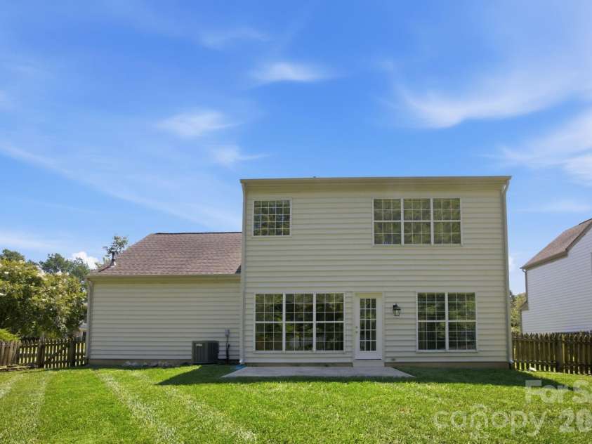 124 Aylesbury Lane, Indian Trail, NC 28079.  MLS# CAR4416136, YatesRealty ID 46745. Back view